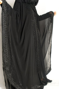 Elegant black chiffon overcoat with lace trim and stonework detailing, wedding attire