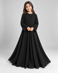 Front view of a girls’ flowing black abaya with a loose, modest fit