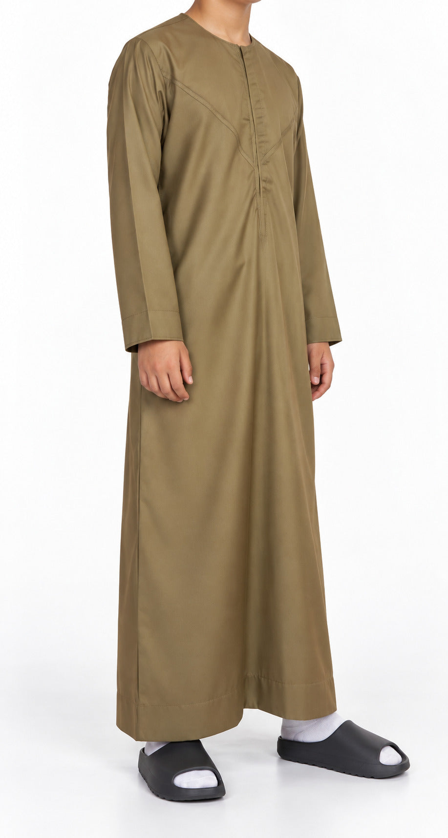 Side view of a boy wearing a royal oak Omani thobe