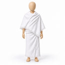 White two-piece children’s ihram with fringed edges displayed on a wooden child-sized mannequin